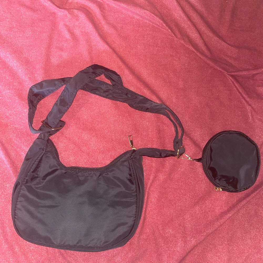 Black adjustable baguette purse with detachable mini coin purse